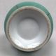Ball vase with bent barrel in celadon green porcelain, nineteenth