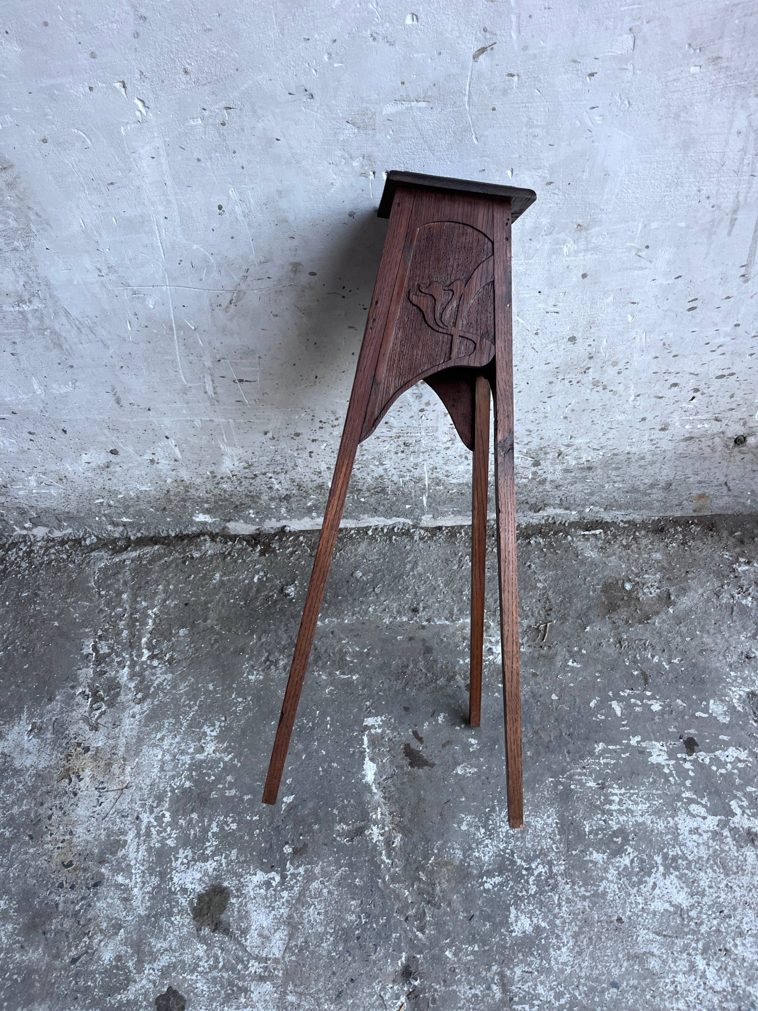 Sculpted wooden plant stand in Art Nouveau style, circa 1910.