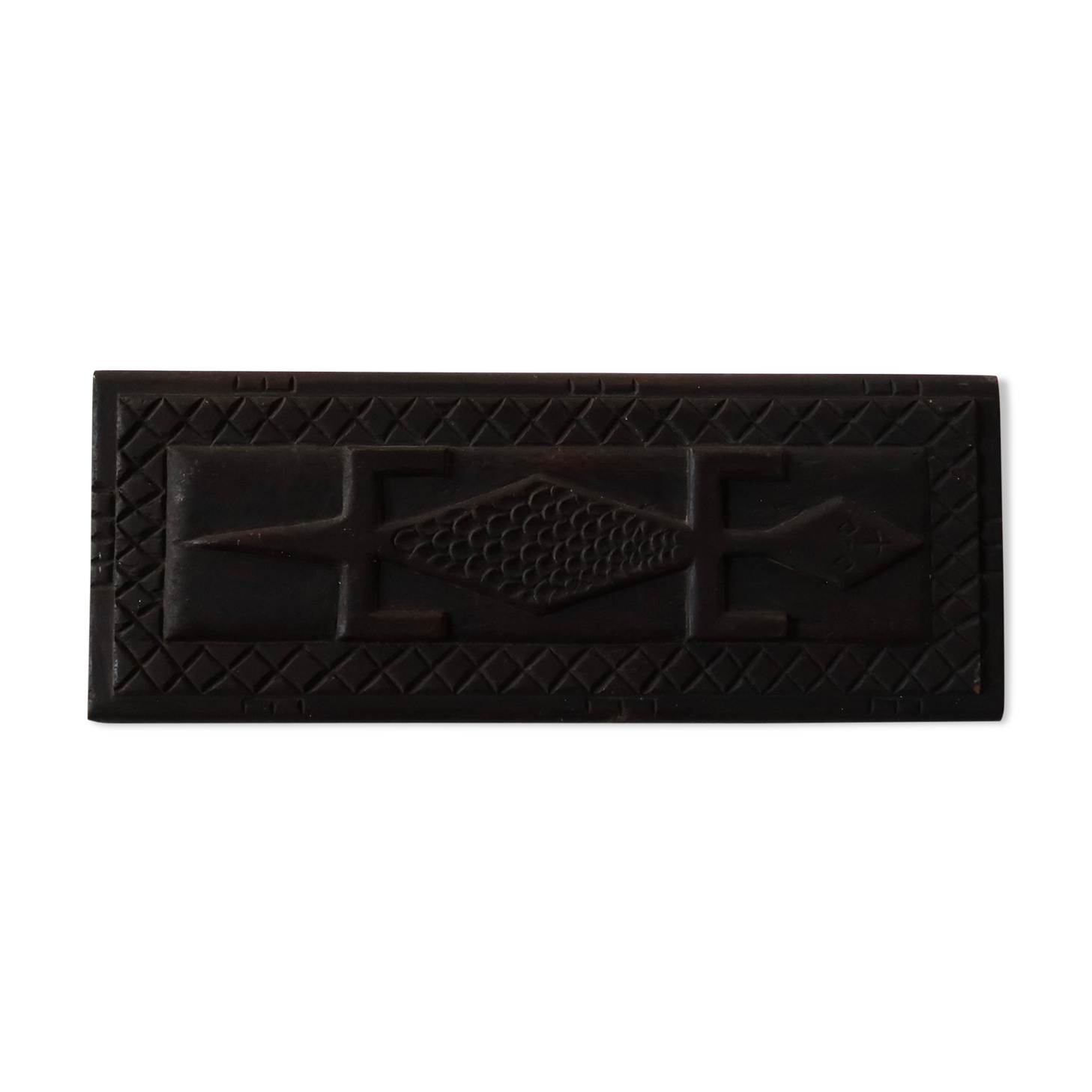 Carved African wall plate, door top