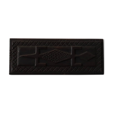 Carved African wall plaque, door top.