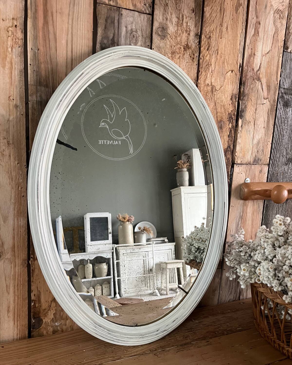 White patinated oval mirror