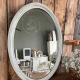 White patinated oval mirror