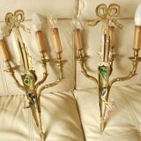 Pair of gilded bronze wall sconces with three lights