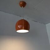 Pair of 70's globes in orange lacquered metal.