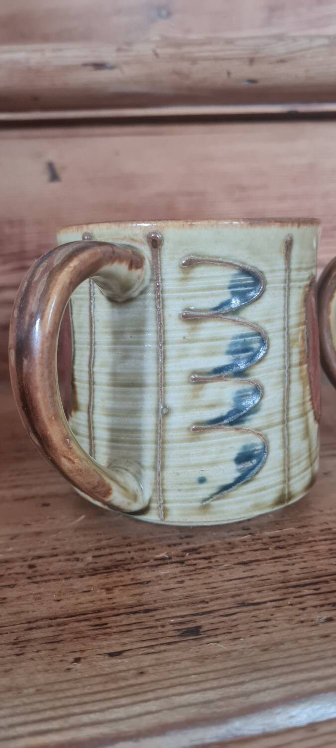 Glazed stoneware mugs from the 60s