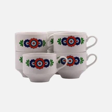 7 white porcelain cups from Winterling with coloured patterns.
