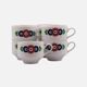 7 white porcelain cups from Winterling with coloured patterns.