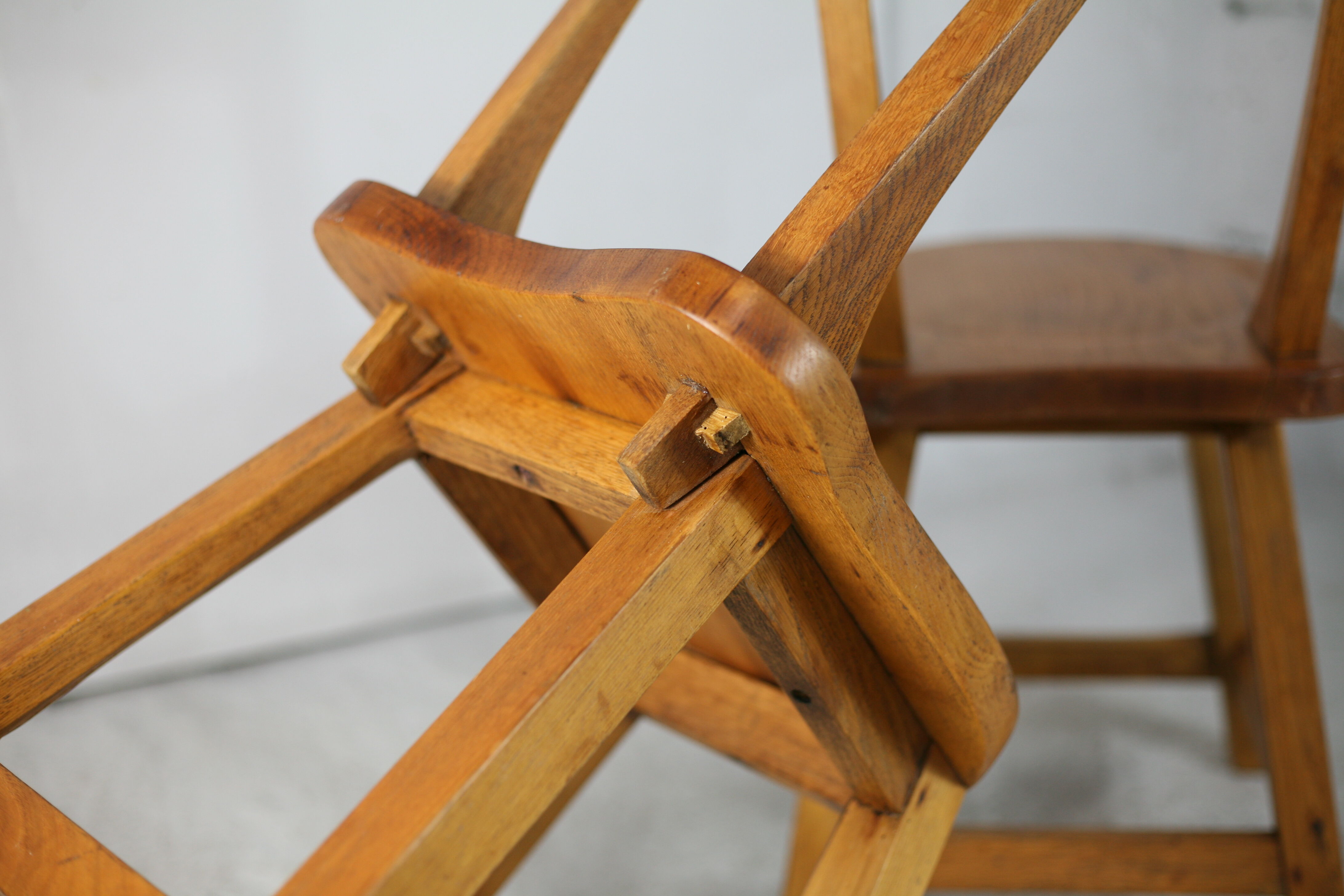 Pair of brutalist wooden back stools. France, circa 1960