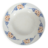 Plat creux Hamage & Moulin des Loups, décor floral pochoir bleu et orangé