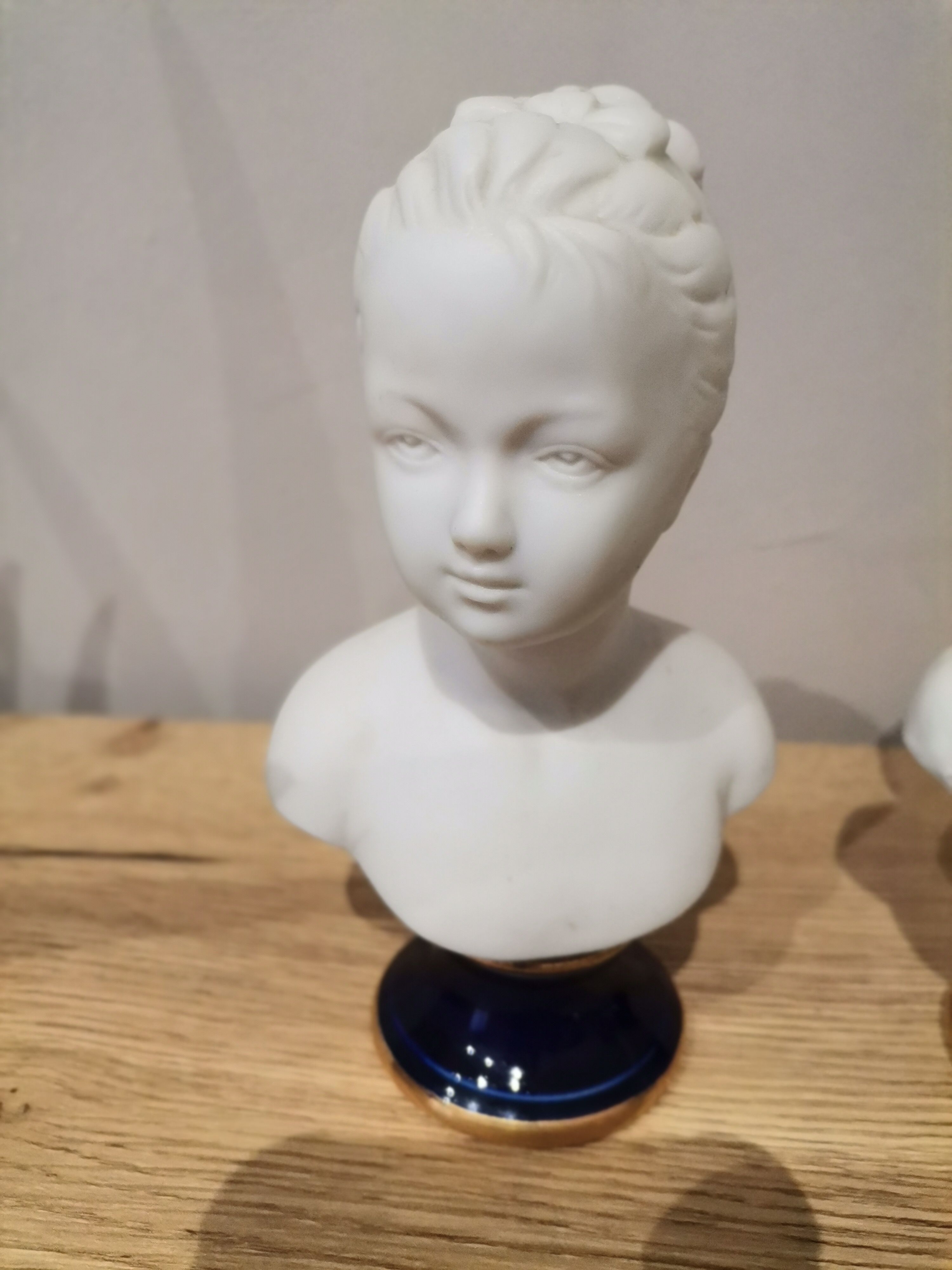 Signed children's busts