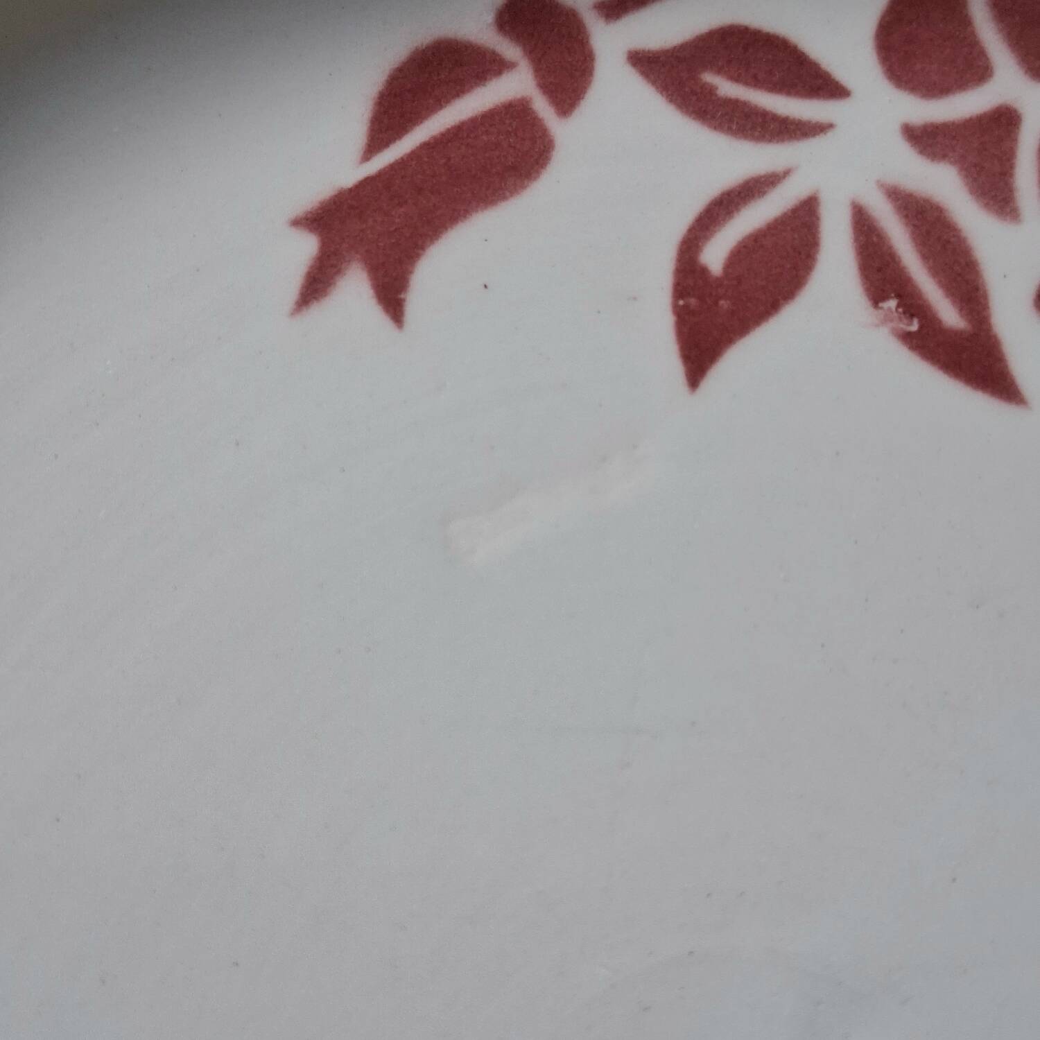 Old mismatched earthenware dinner plates