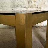 Trio of nesting tables, brass structures and smoked mirror tops