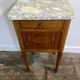 Louis XVI style bedside table, with a marble top and marquetry.
