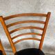 Set of 4 vintage wooden chairs with faux leather.