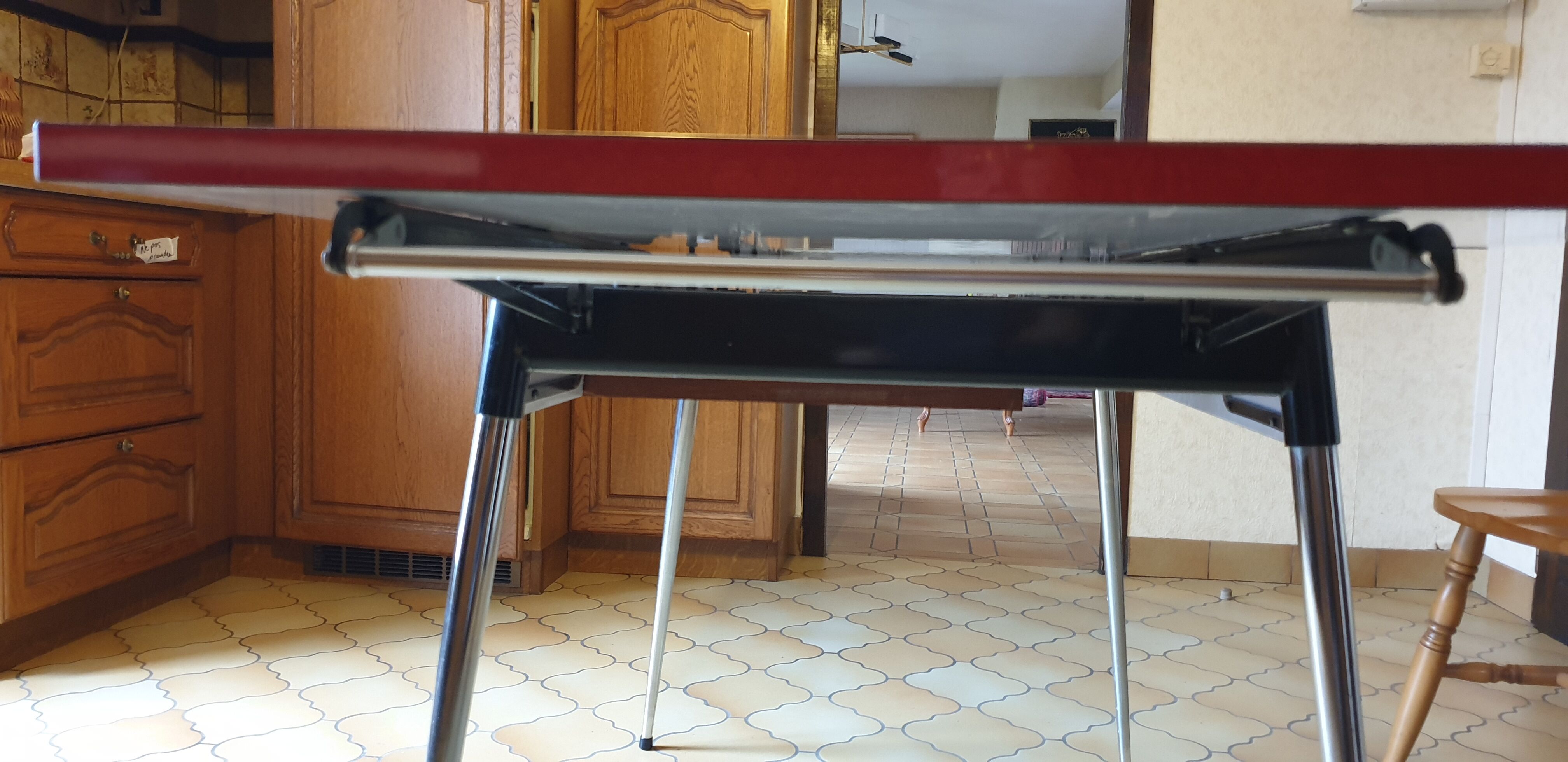 Extendable red formica table