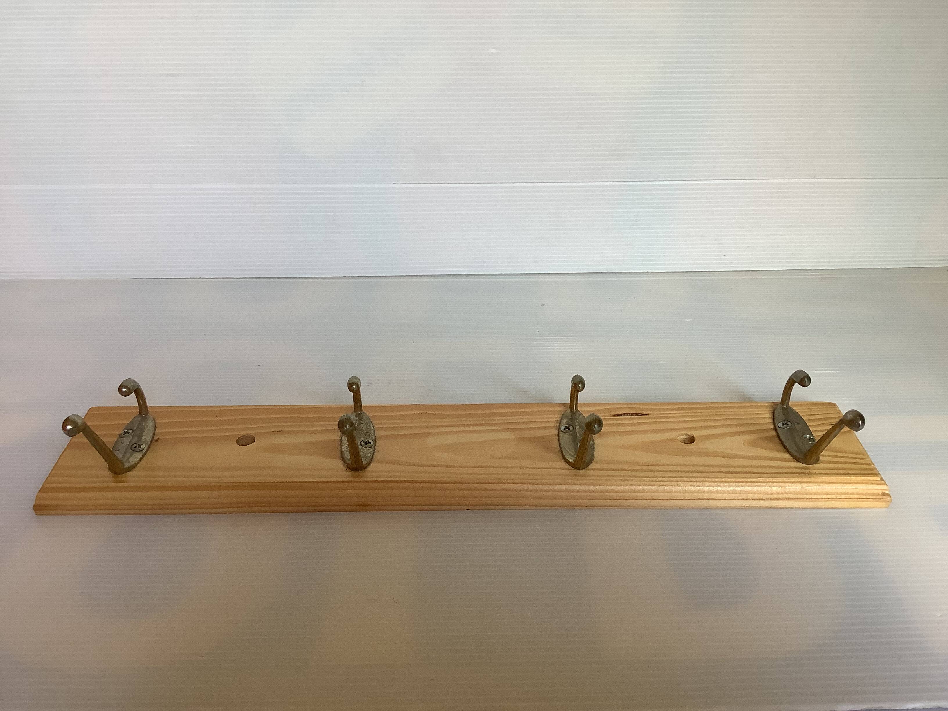 Wooden coat rack with four hooks