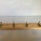 Wooden coat rack with four hooks