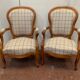 Paire de fauteuils de style Louis Philippe en hêtre teinté XX siècle