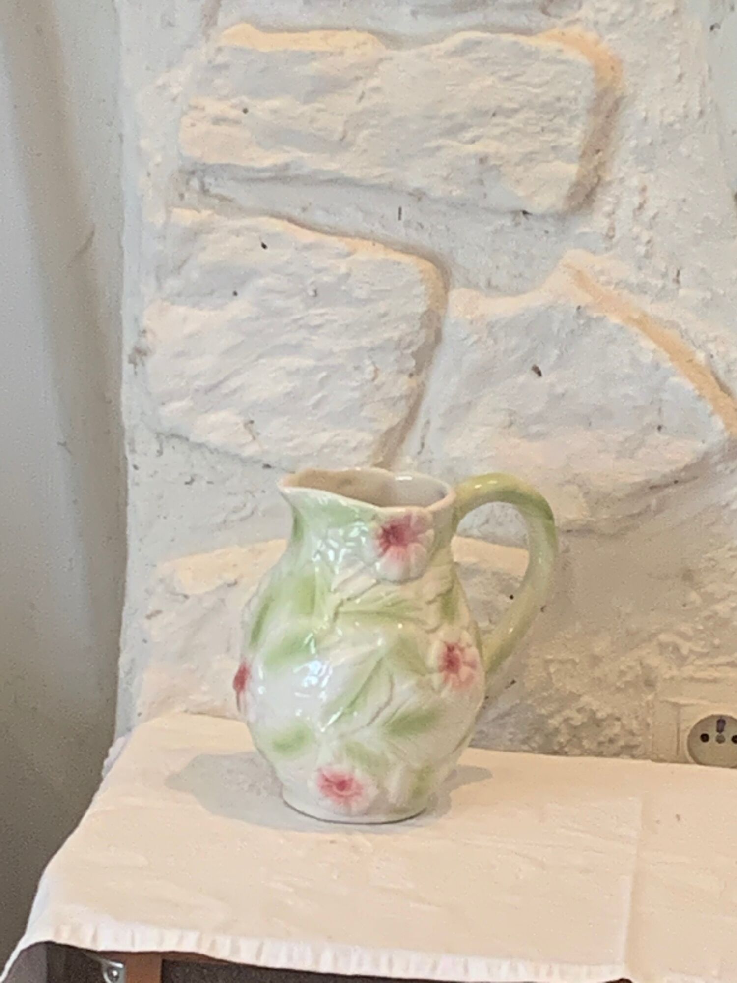 Ceramic dabbling jug enamelled floral motif