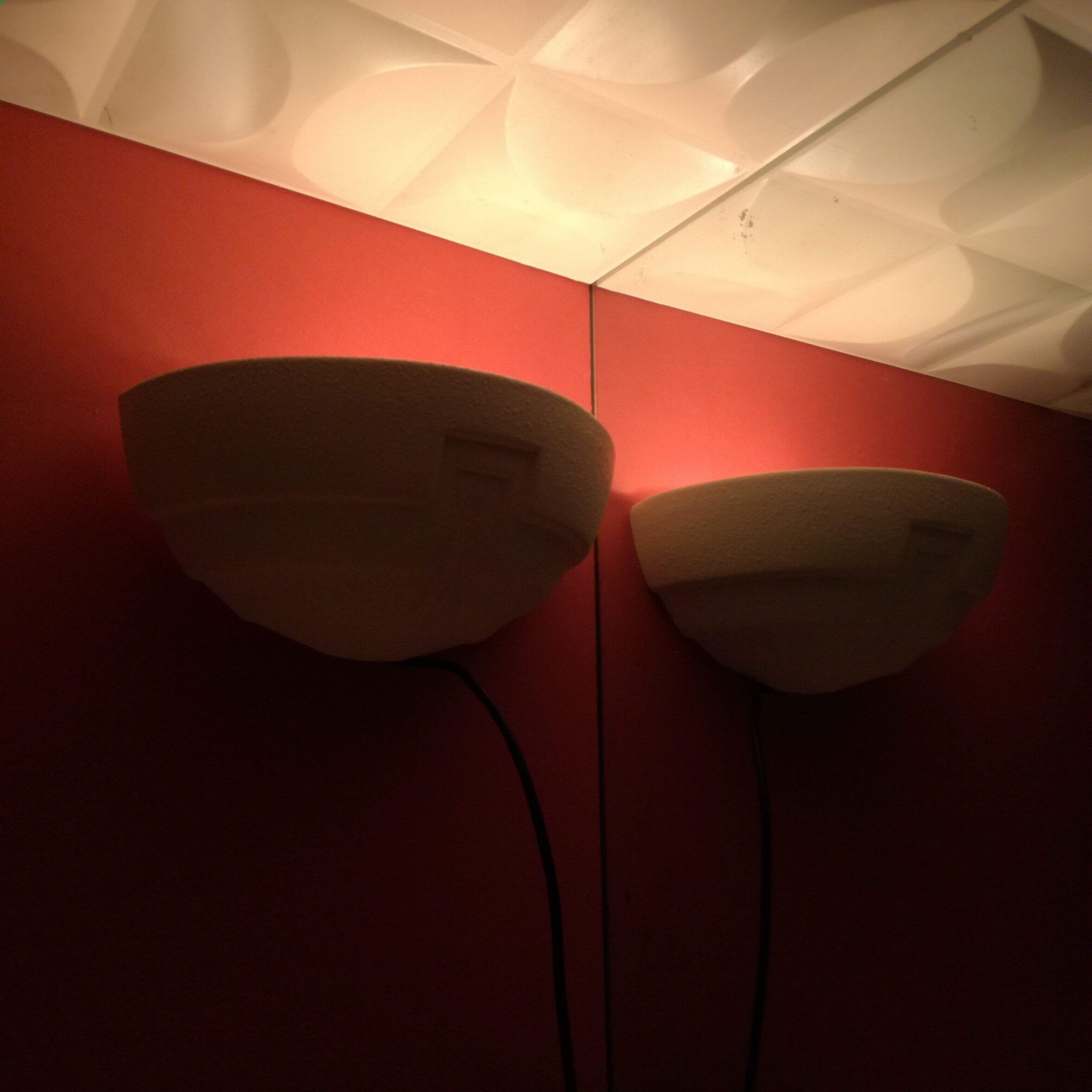 Wall sconces in stone and in the shape of a basin