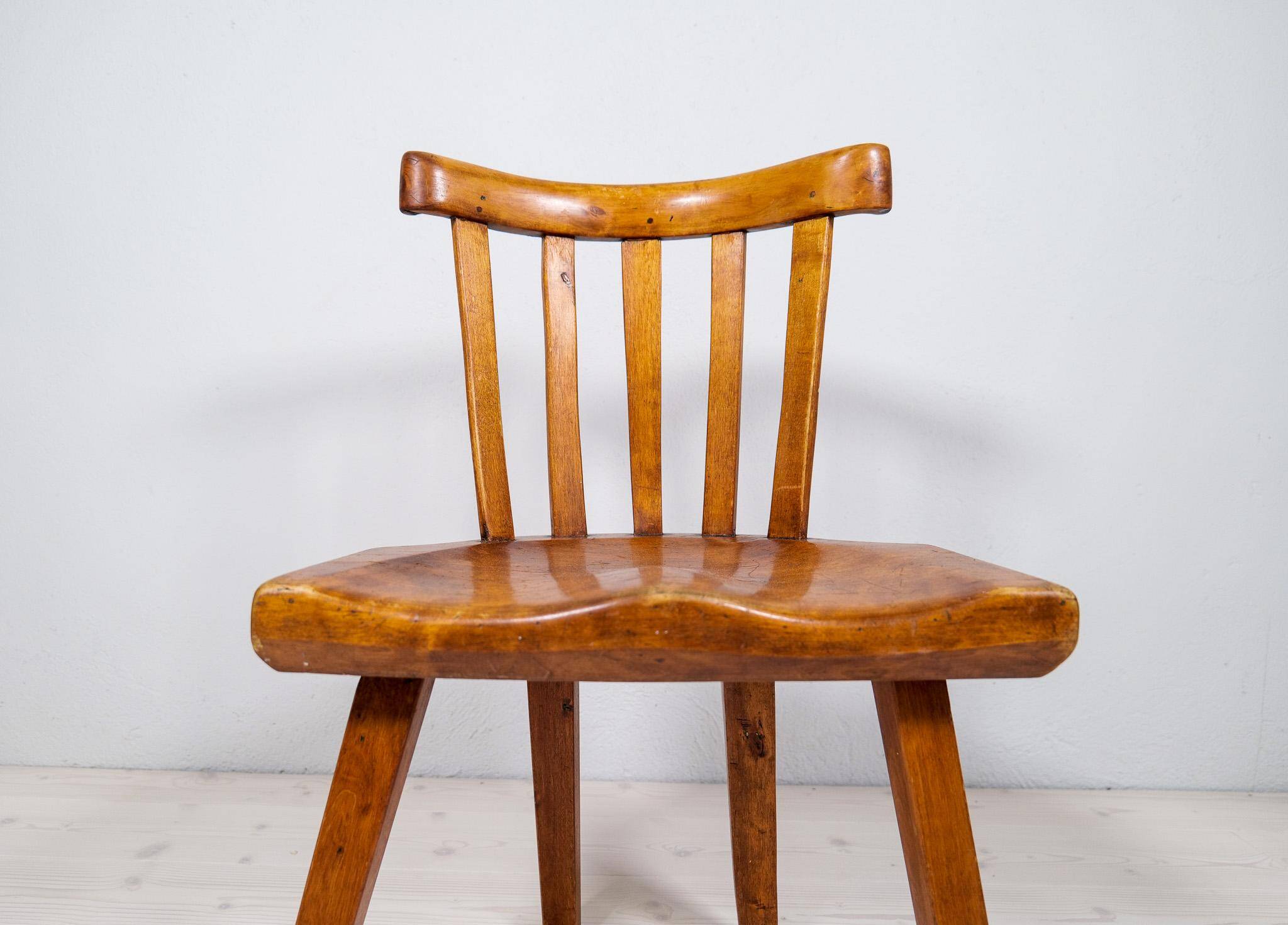 Swedish folk art chair from the 19th century with highly decorative forms.
