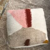 Woven wool pouf