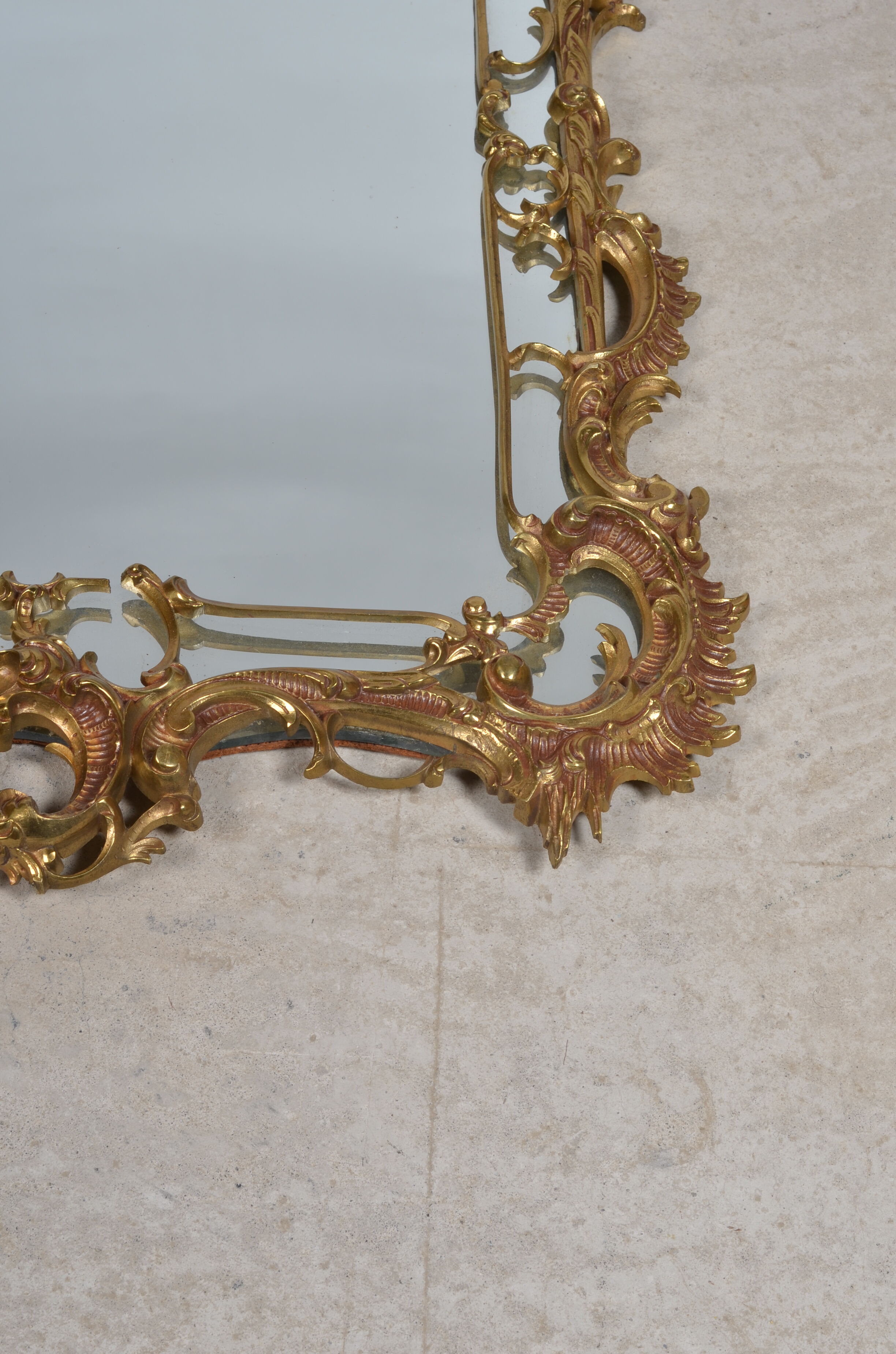 Mirror with baroque style parecloses in bronze 102 x 61 cm