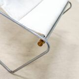 A pair of low chairs. France 70s