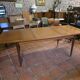Table scandinave galbée extensible papillon en teck années 60