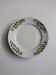Old round footed plate signed Labrut brothers flowers