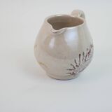 Pair of ceramic milk jugs signed La Roue Vallauris