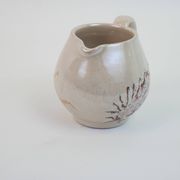 Pair of ceramic milk jugs signed La Roue Vallauris