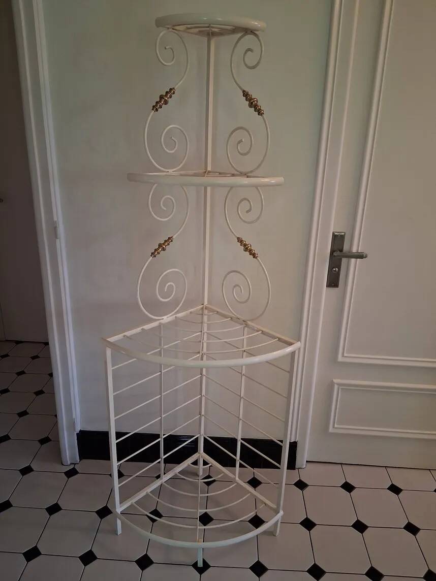 Cream and brass corner bakery shelf in wrought iron