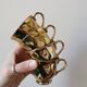 Vintage golden porcelain cups