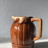 Small brown ceramic pitcher