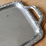 Vintage silver-plated metal tray with handles and embossed pattern