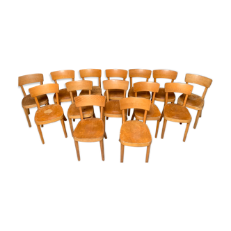 Series of 14 light wooden bistro chairs