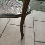 Old oval table with marble top, Louis XVI style
