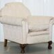 Victorian suite in damask, walnut frame, legs carved in lion's paw.