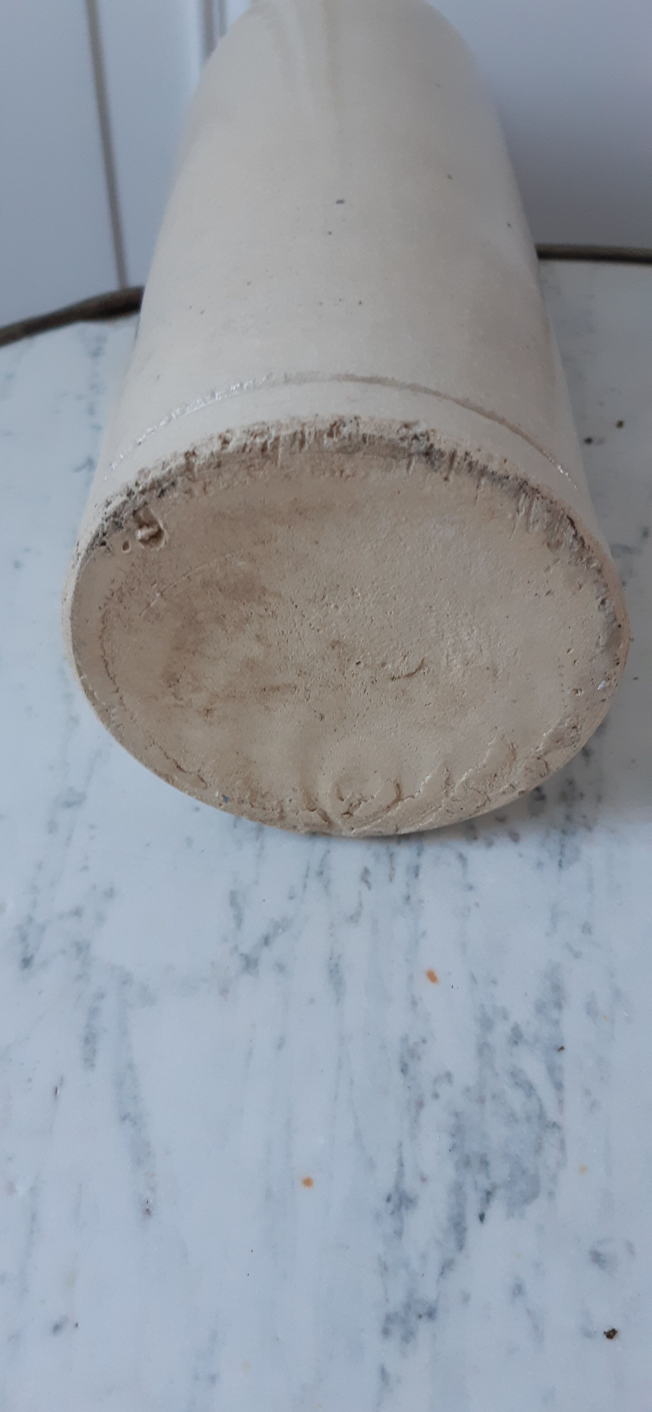 Bottle in ancient artisanal sandstone