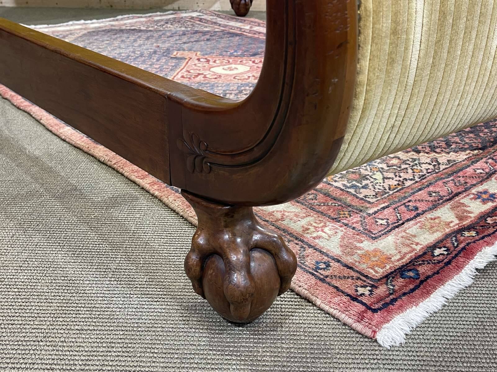 Early 19th century Empire mahogany bed with swan neck finials and claw feet