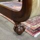 Early 19th century Empire mahogany bed with swan neck finials and claw feet