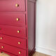 Chest of drawers with 5 drawers in black cherry.