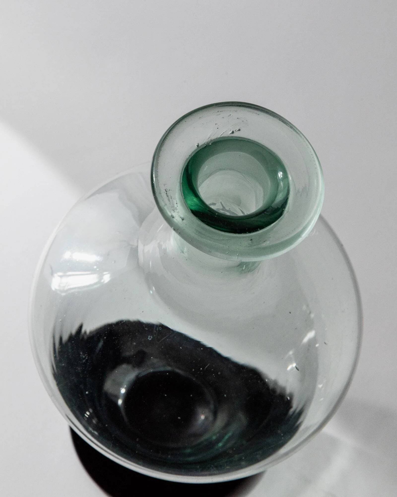 Vintage Murano glass carafe from the 1960s, green and black, with a stopper.