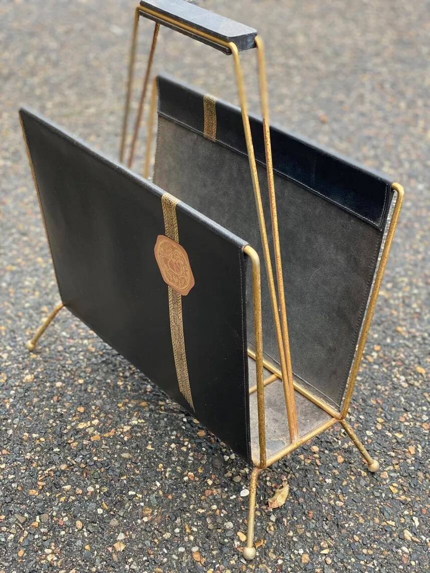 Vintage magazine rack in black leather and gold metal