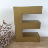 Golden vintage sign letter E