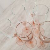 6 champagne flutes with pink stems