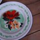 7 printed floral enamel plates "bon voyage" Made in China