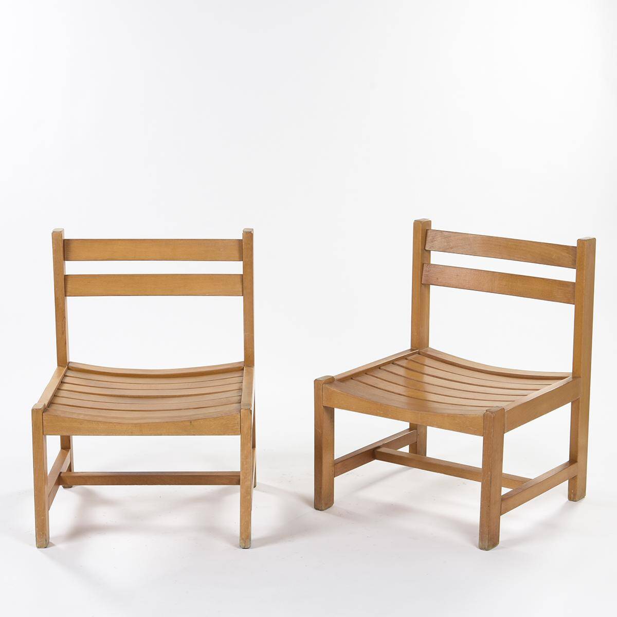 Pair of low chairs by André Sornay, circa 1960
