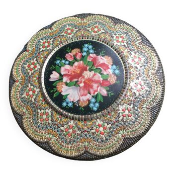 Old round floral box in relief